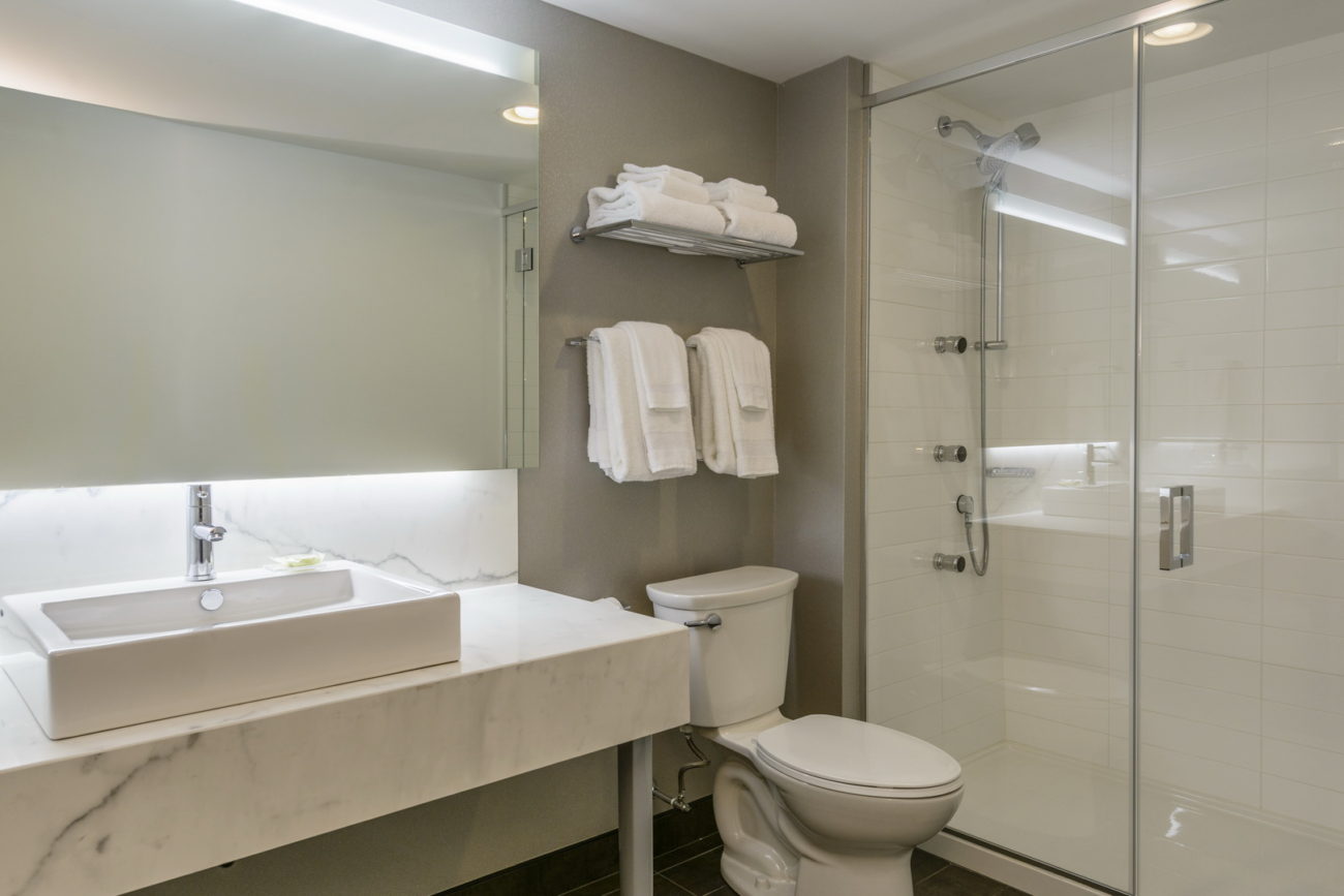 White Marble Countertops in the Rodd Miramichi Bathrooms